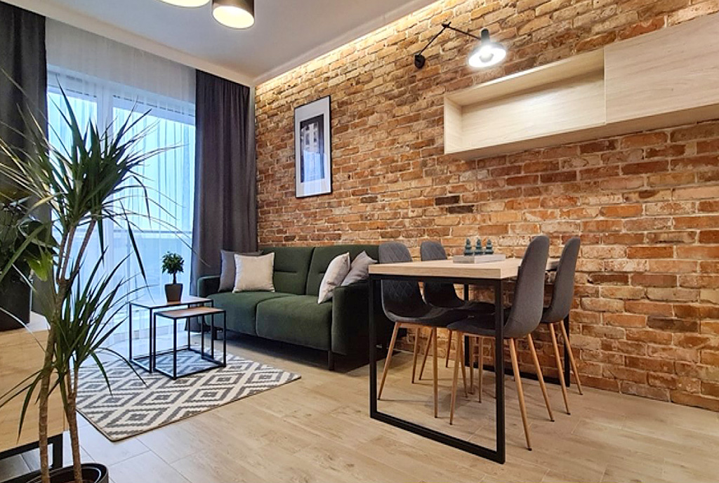 fragment salonu w ekskluzywnym apartamencie do wynajmu Wieluń