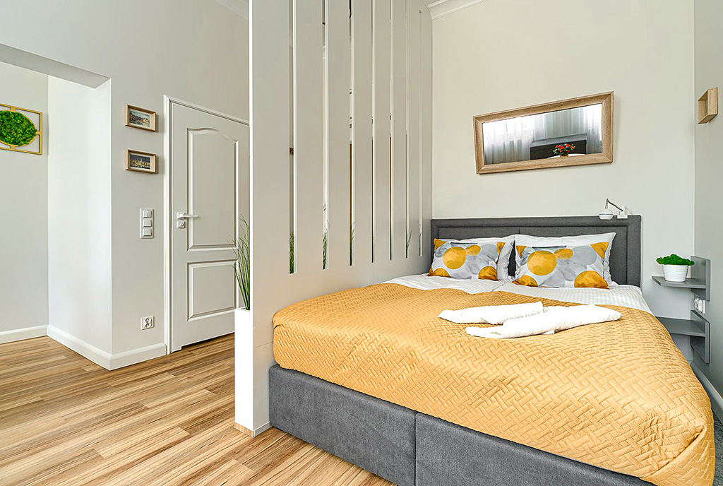elegancka sypialnia w ekskluzywnym apartamencie do wynajęcia Szczecin