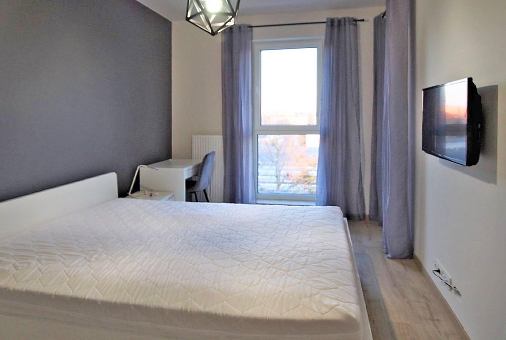 elegancka sypialnia w luksusowym apartamencie do wynajęcia Łódź