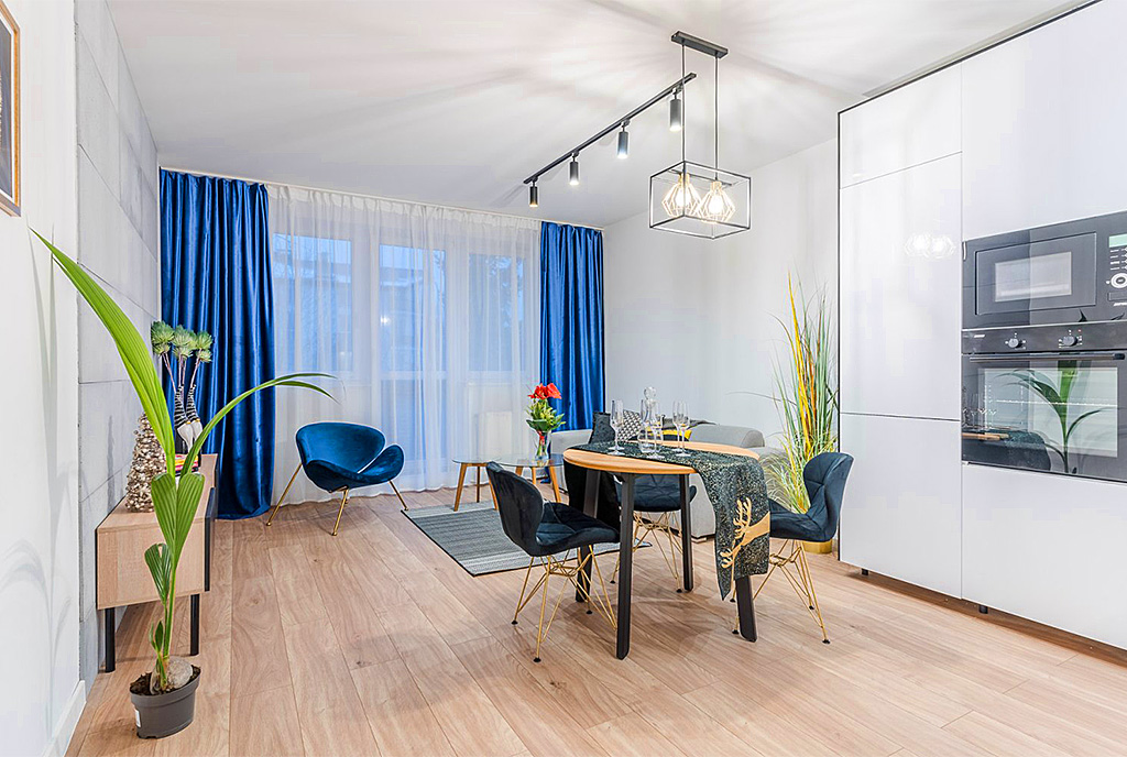przeciwległa strona salonu w luksusowym apartamencie na sprzedaż Gdańsk