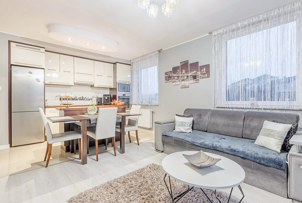 imponujący pokój dzienny w ekskluzywnym apartamencie na sprzedaż Gdańsk