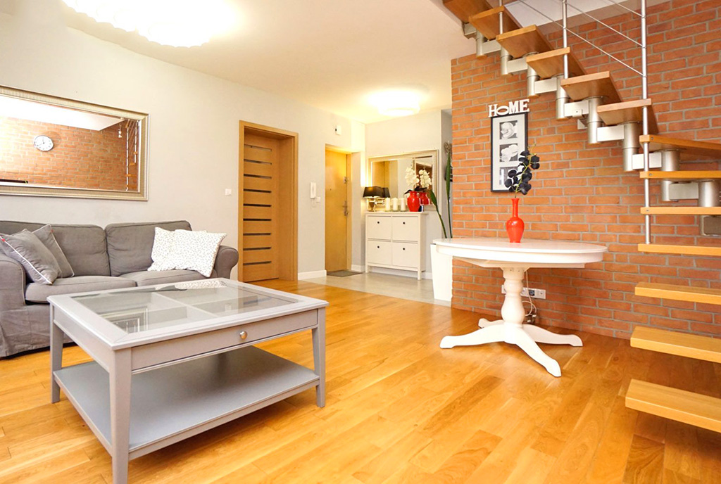 zapierający dech w piersiach salon w ekskluzywnym apartamencie na sprzedaż Konin