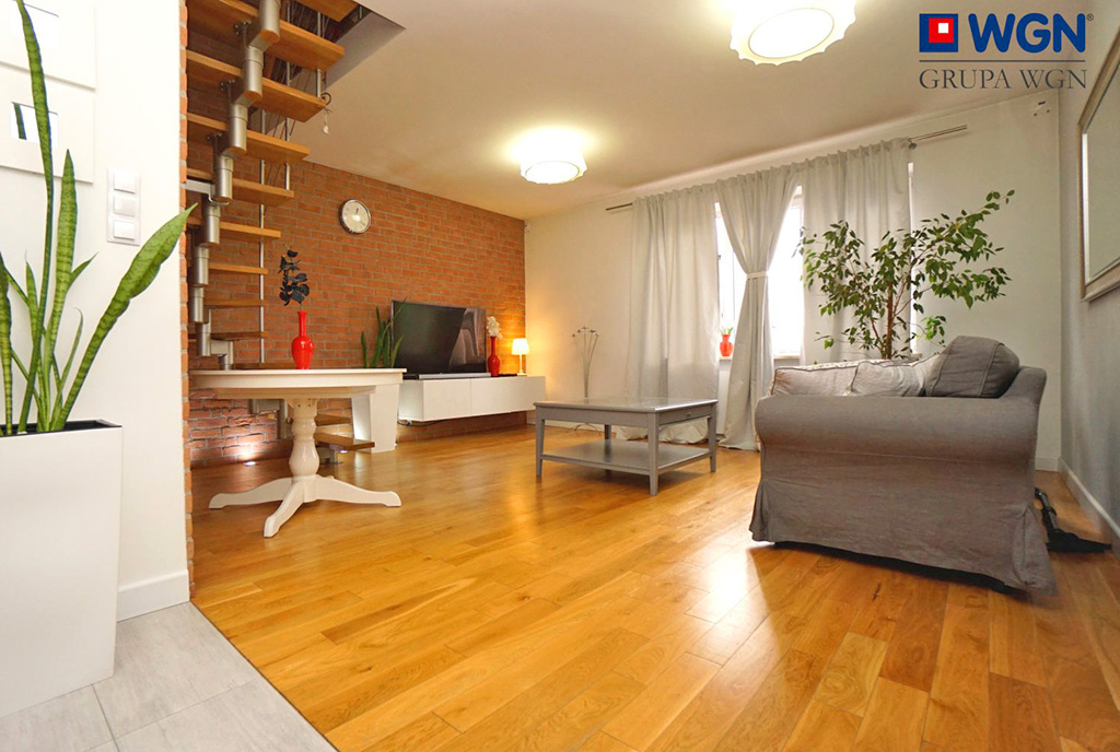 okazały pokój dzienny w ekskluzywnym apartamencie do sprzedaży Konin