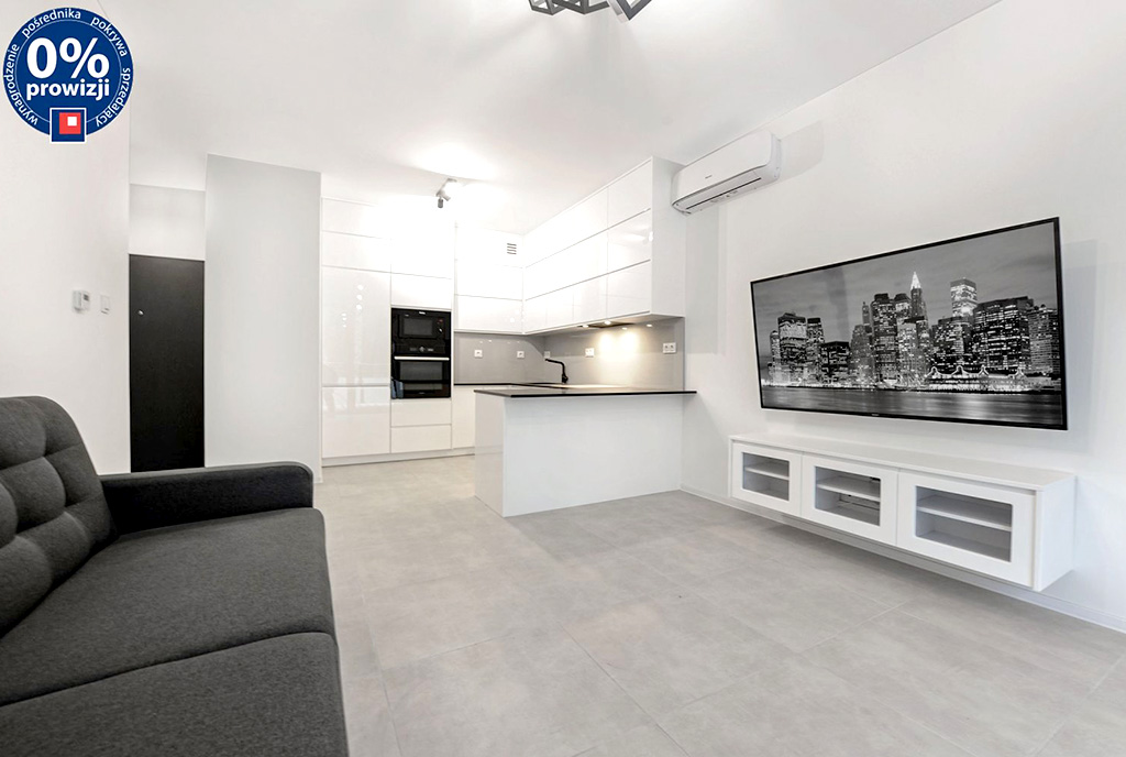 widok z salonu na aneks kuchenny w luksusowym apartamencie na sprzedaż Katowice (okolice)