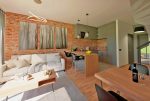 prestiżowy pokój dzienny w luksusowym apartamencie na sprzedaż Tarnów