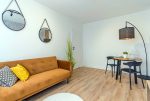 przeciwległa strona pokoju dziennego w luksusowym apartamenie na sprzedaż Gdańsk