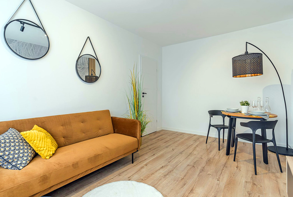 przeciwległa strona pokoju dziennego w luksusowym apartamenie na sprzedaż Gdańsk