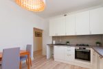 komfortowa zabudowa kuchni w ekskluzywnym apartamencie do sprzedaży Tarnów