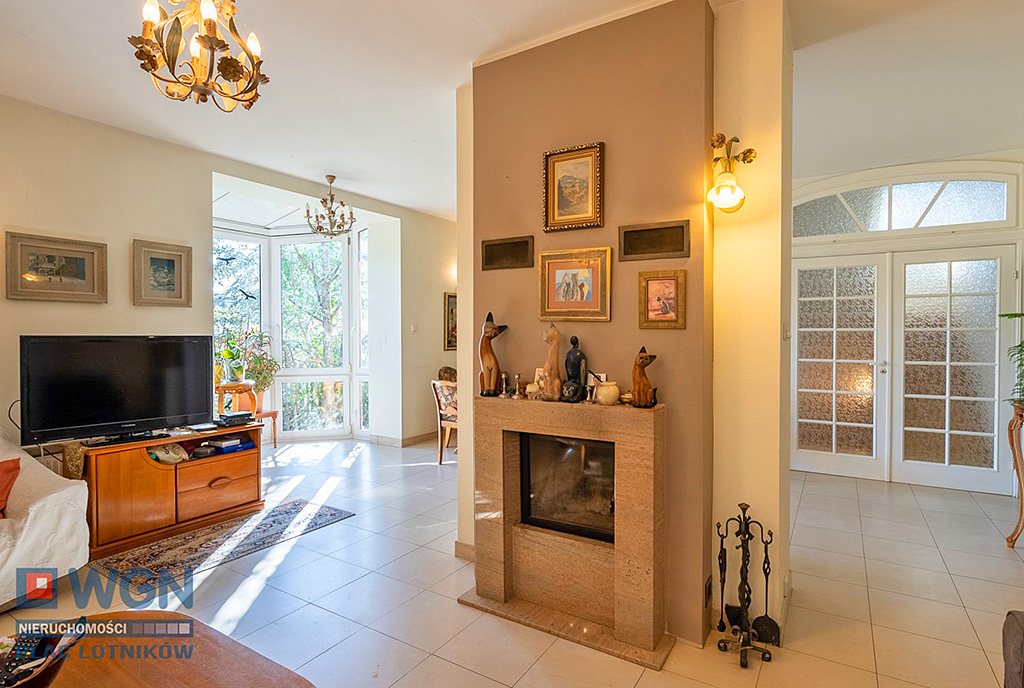 kominek w salonie luksusowej willi na sprzedaż Szczecin