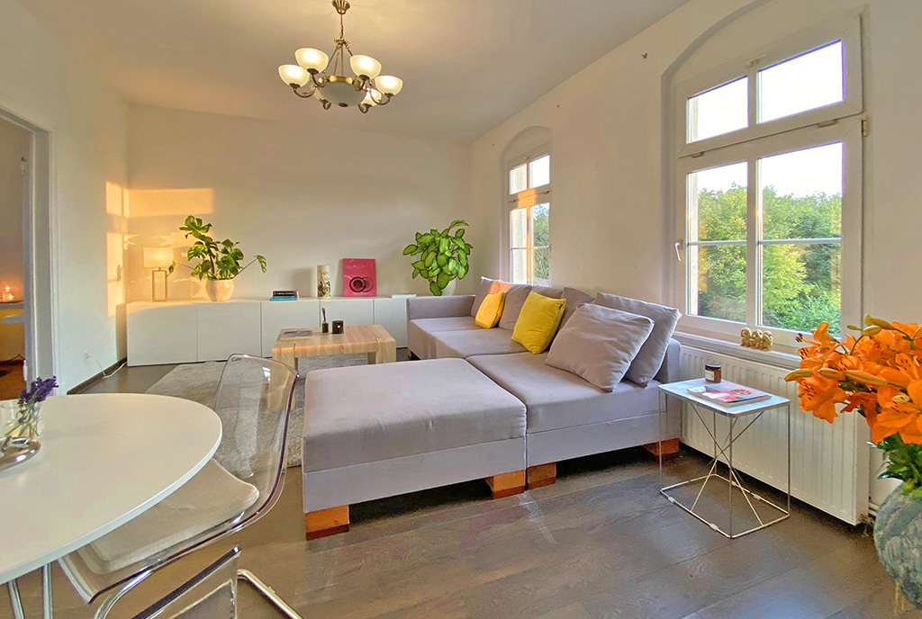 wytworny salon w luksusowym apartamencie na sprzedaż Gdańsk górna kondygnacja ekskluzywnego apartamentu na sprzedaż Gdańsk