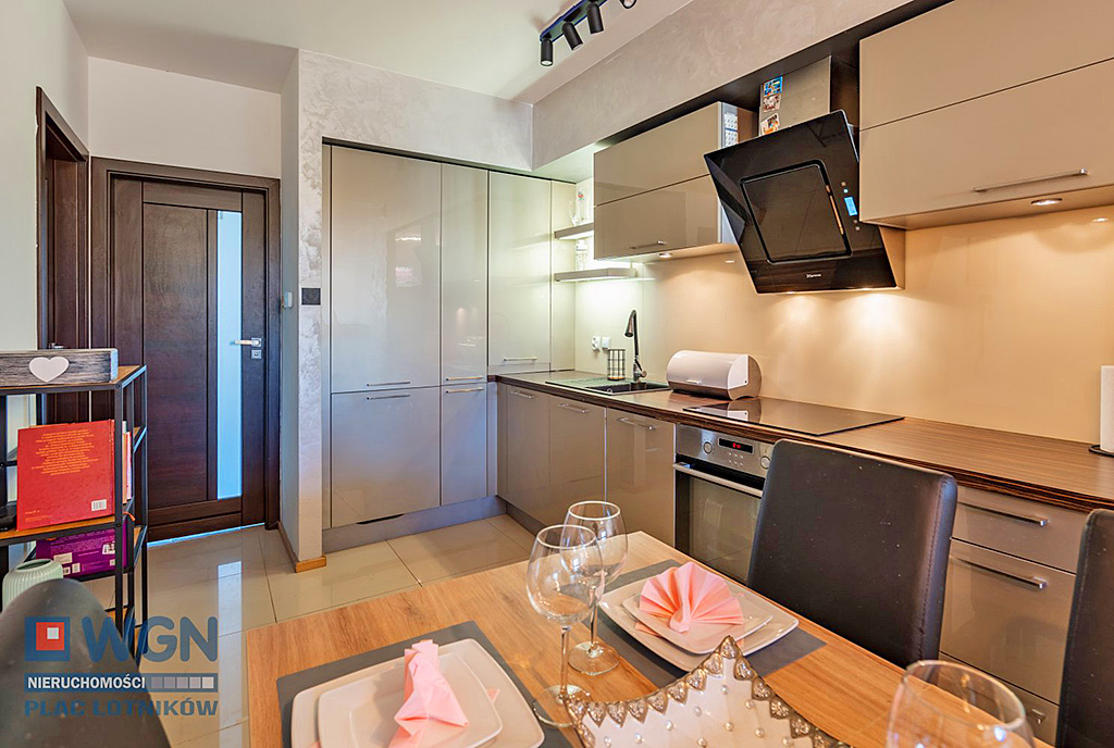 jadalnia oraz kuchnia w luksusowym apartamencie na sprzedaż Szczecin