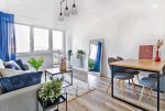 widok na pokój dzienny w luksusowym apartamencie do sprzedaży Tarnów