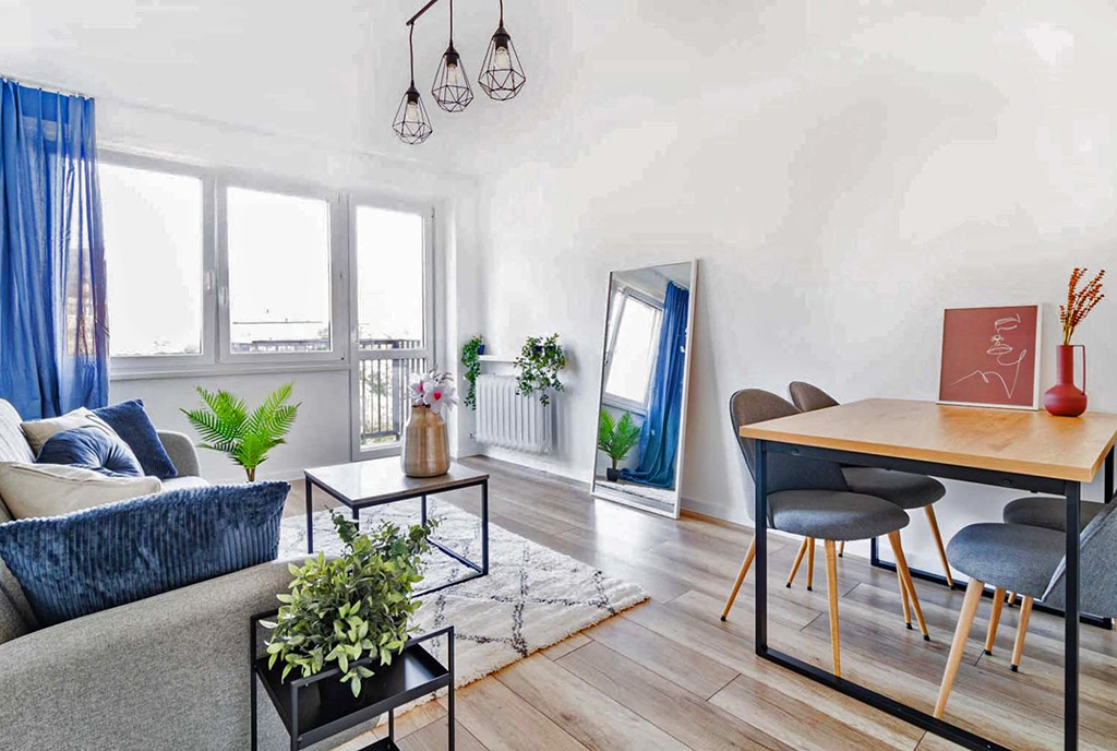 widok na pokój dzienny w luksusowym apartamencie do sprzedaży Tarnów