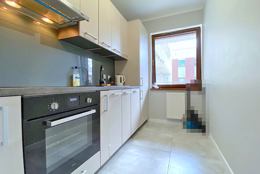 nowoczesna zabudowa kuchni w luksusowym apartamencie do wynajmu Szczecin