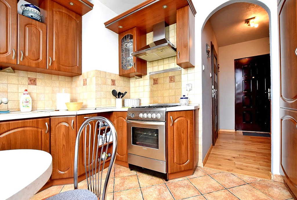 komfortowo zabudowana kuchnia w ekskluzywnym apartamencie na sprzedaż Inowrocław