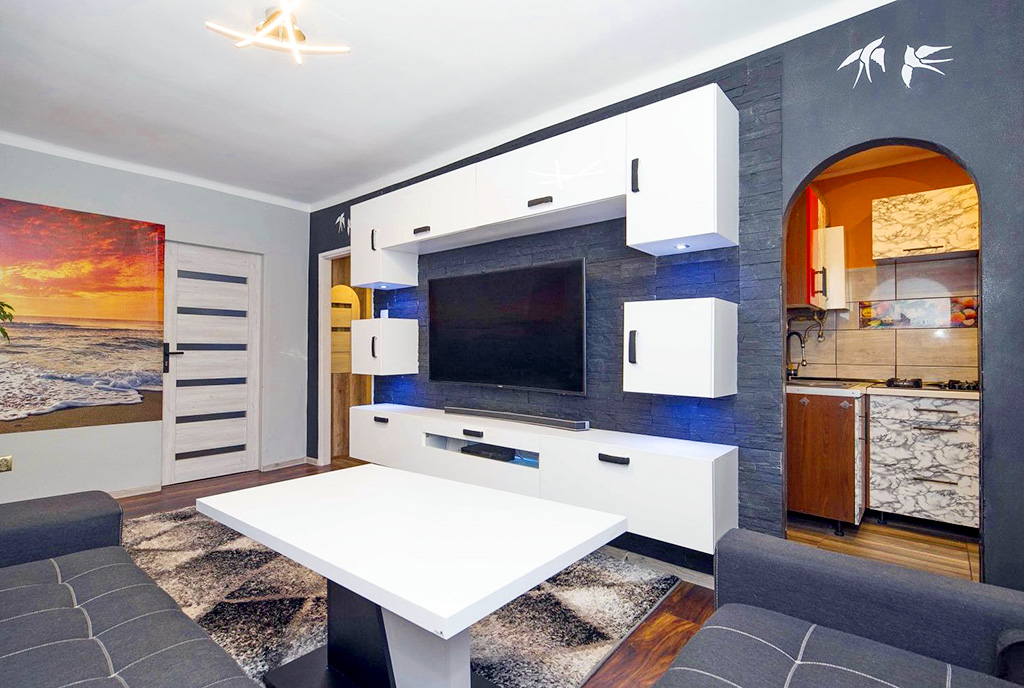 nowoczesny pokój dzienny w ekskluzywnym apartamencie do sprzedaży Katowice (okolice)