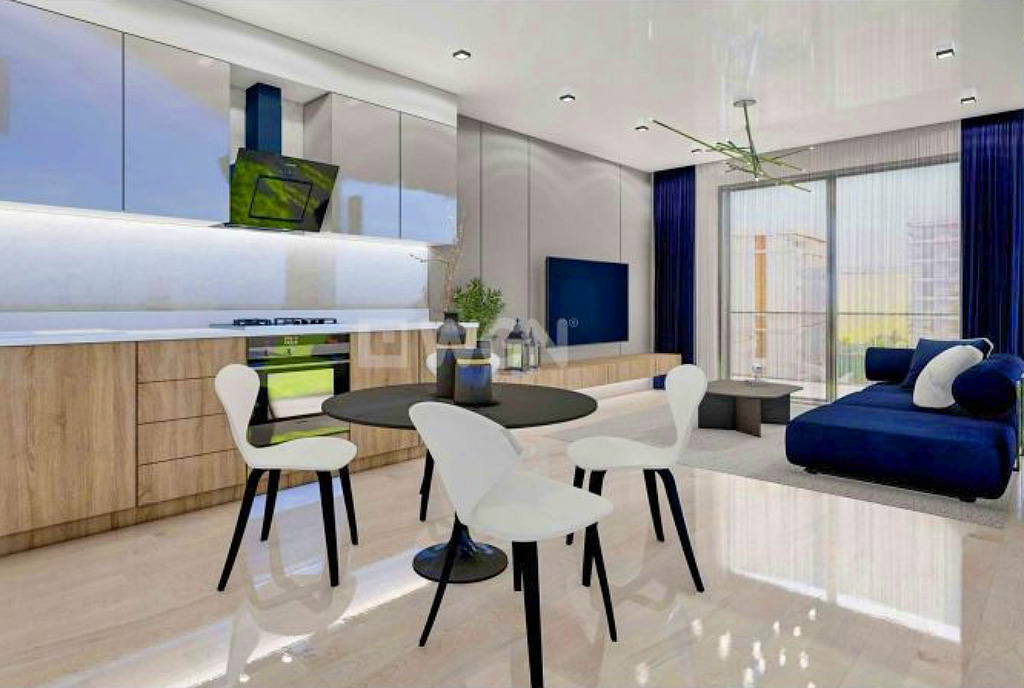 na pierwszym planie jadalnia w luksusowym apartamencie na sprzedaż Cypr (Iskele)
