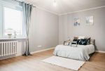 zaciszna sypialnia w ekskluzywnym apartamencie na sprzedaż Kalisz