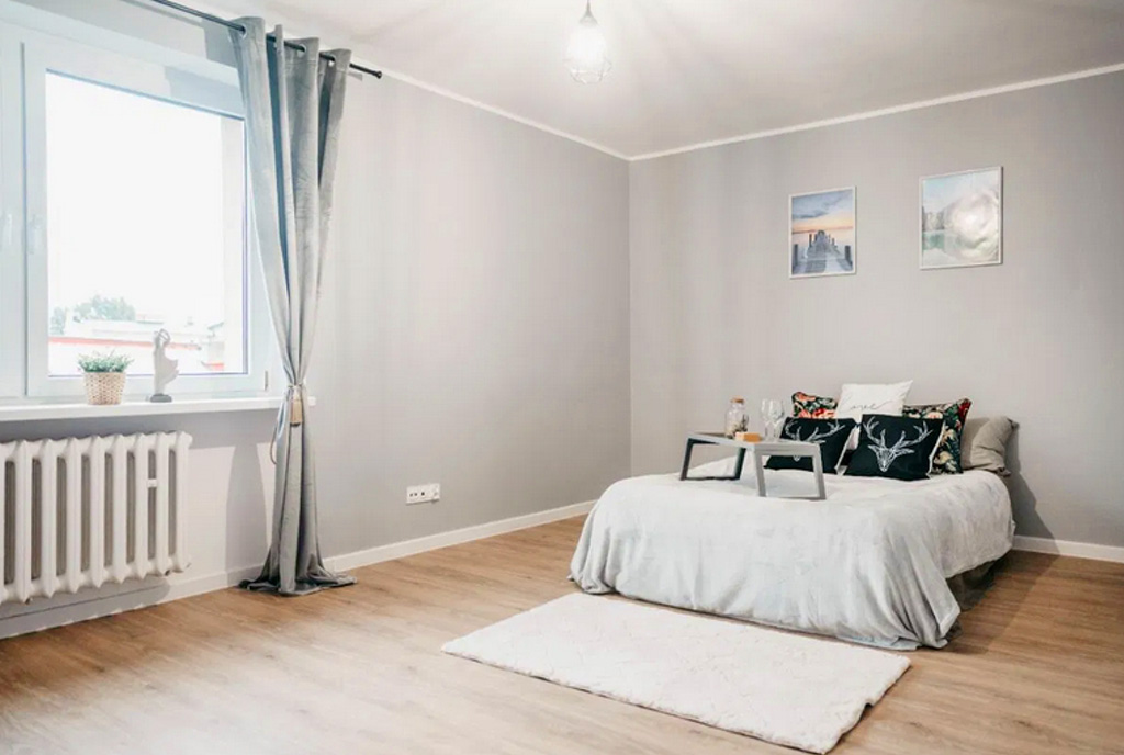 zaciszna sypialnia w ekskluzywnym apartamencie na sprzedaż Kalisz