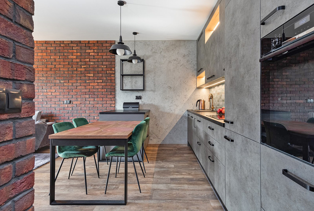 surowa kuchnia oraz jadalnia w luksusowym apartamencie na sprzedaż Szczecin