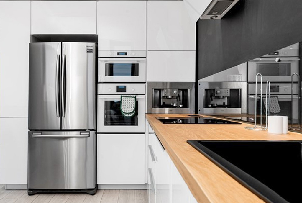 funkcjonalnie zaaranżowana kuchnia w luksusowym apartamencie do wynajmu Wrocław