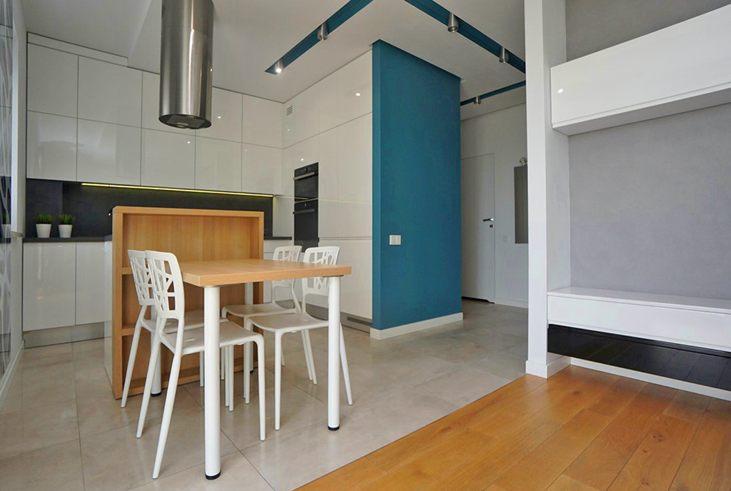 widok na jadalnię i aneks kuchenny w luksusowym apartamencie do wynajmu Piotrków Trybunalski