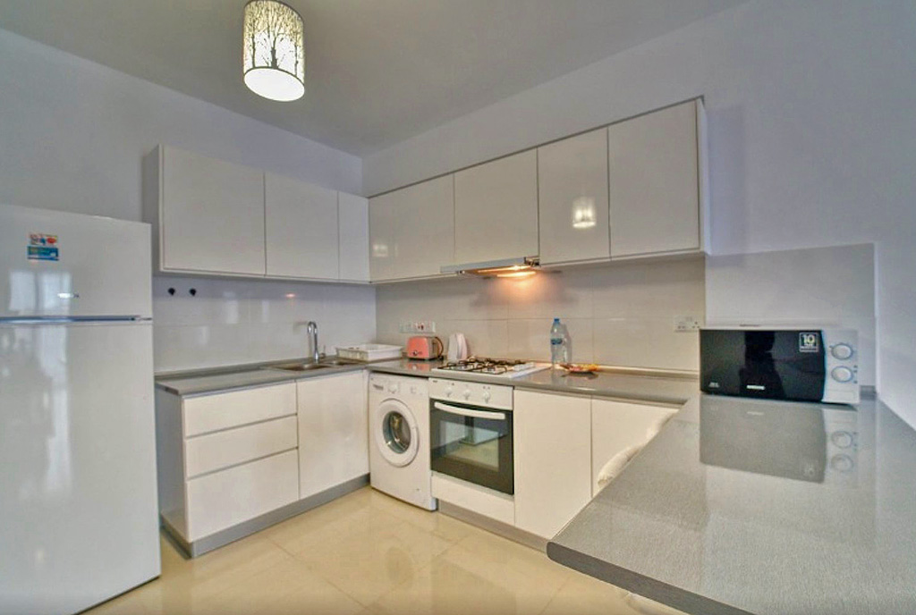 praktycznie zaaranżowana kuchnia w luksusowym apartamencie na sprzedaż Cypr (Iskele)