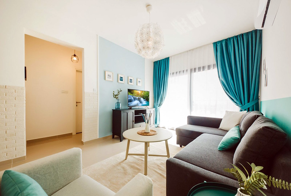 inna perspektywa pokoju gościnnego w luksusowym apartamencie do sprzedaży Cypr (Iskele)