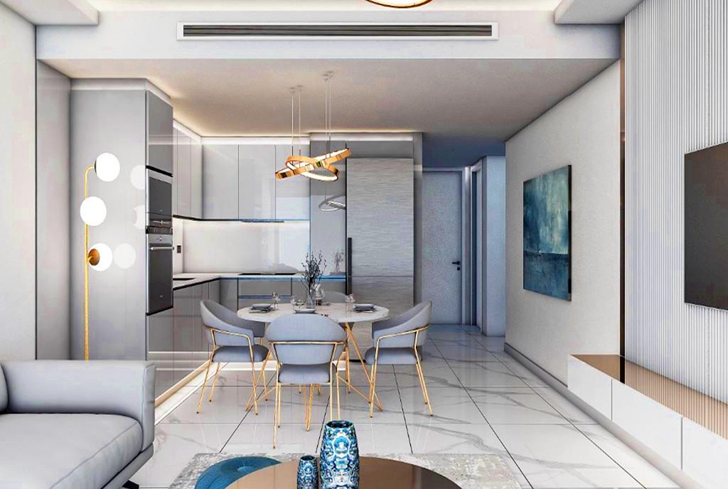 widok z salonu na aneks kuchenny w luksusowym apartamencie do sprzedaży Cypr (Iskele)