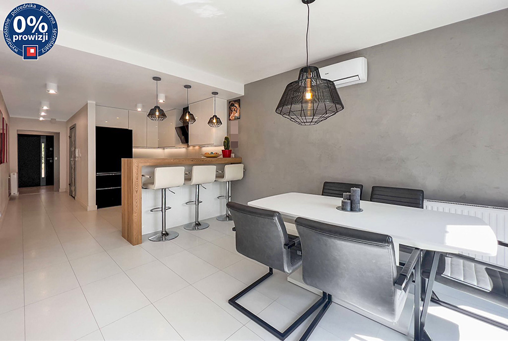 widok na jadalnię i kuchnię w ekskluzywnym apartamencie do sprzedaży Katowice (okolice)