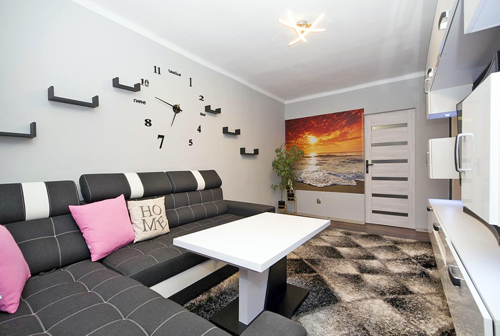 zaaranżowany we współczesnym designie salon w luksusowym apartamencie na sprzedaż Katowice (okolice)