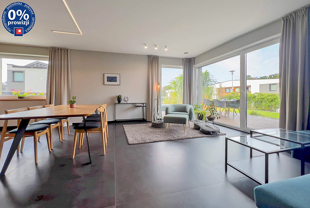 przestronny salon i taras przy ekskluzywnym apartamencie do sprzedaży Katowice (okolice)