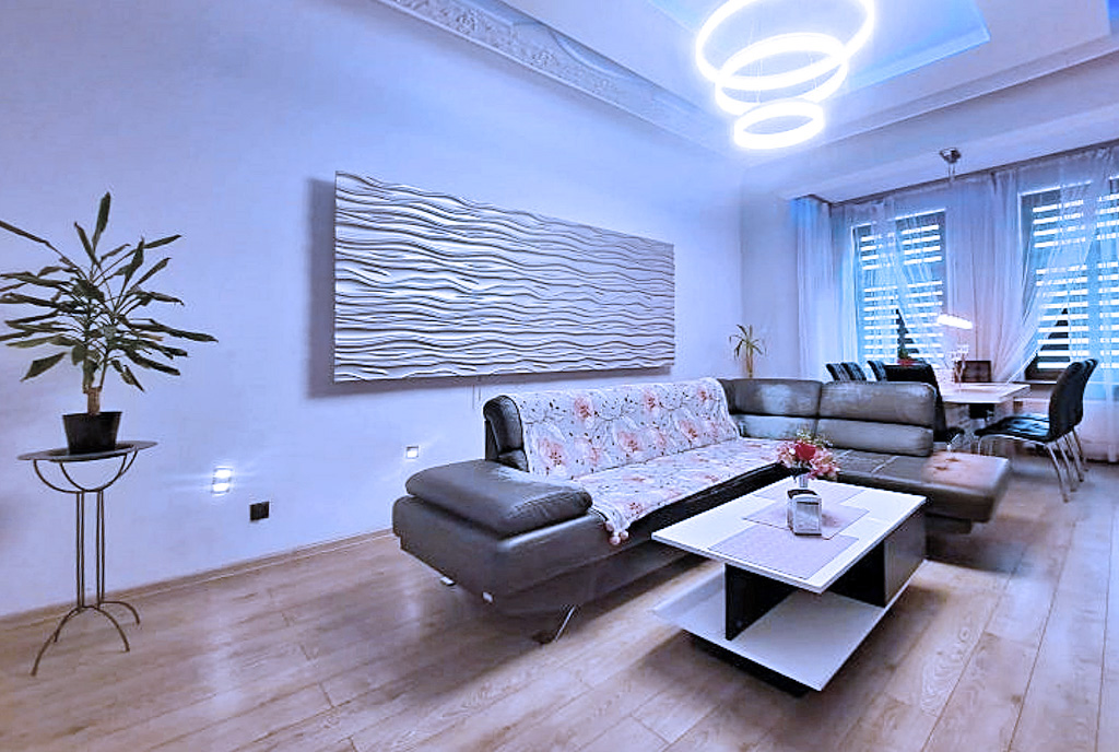 imponujące i miłe dla oka oświetlenie pokoju gościnnego w luksusowym apartamencie do sprzedaży Legnica