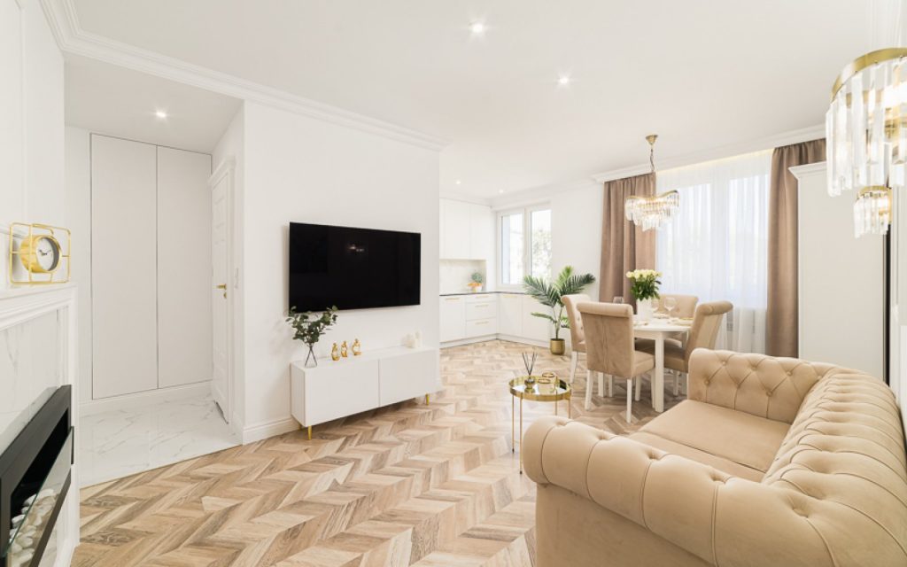 przestronny salon w ekskluzywnym apartamencie do sprzedaży Łódź