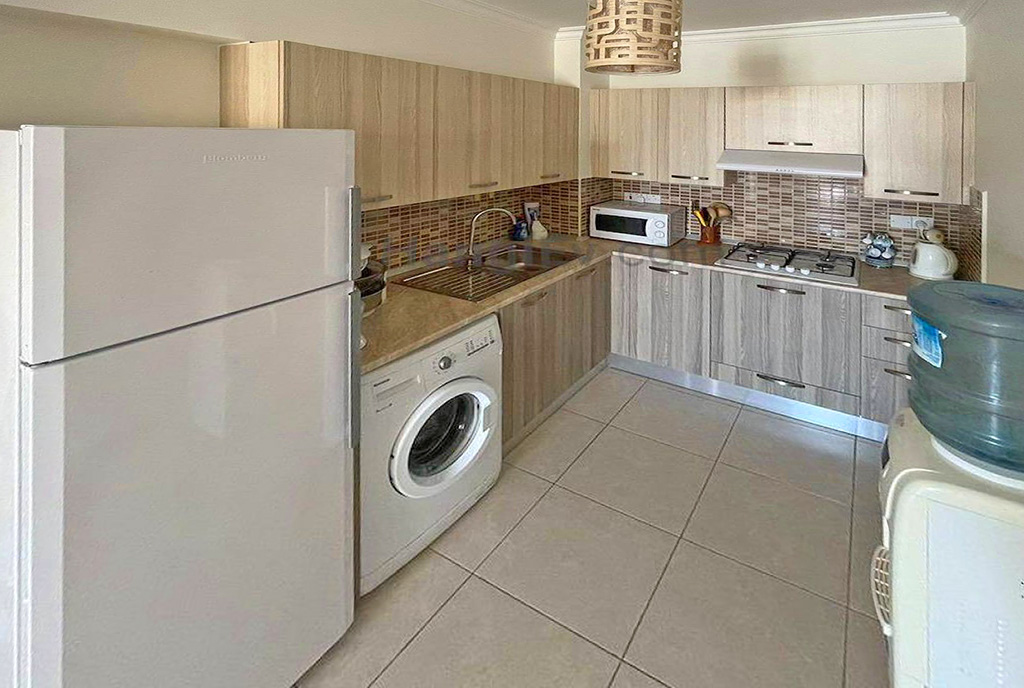 funkcjonalnie zaaranżowana kuchnia w ekskluzywnym apartamencie na sprzedaż Cypr (Iskele)