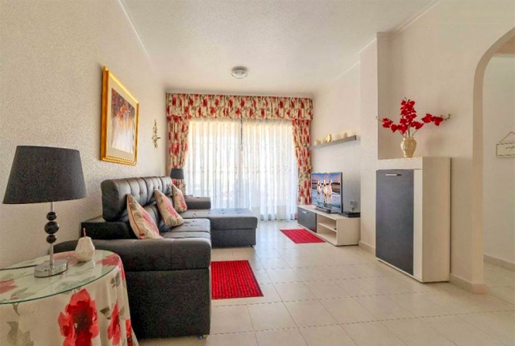 słoneczny pokój gościnny w ekskluzywnym apartamencie do sprzedaży Hiszpania (Orihuela Costa)