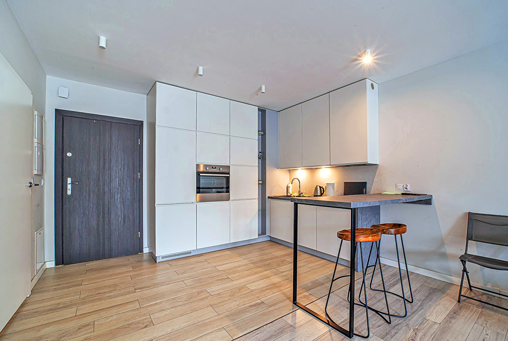 funkcjonalna, stylowa kuchnia w luksusowym apartamencie do wynajmu Bolesławiec