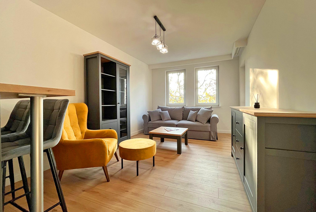 druga strona pokoju dziennego w luksusowym apartamencie do wynajmu Szczecin