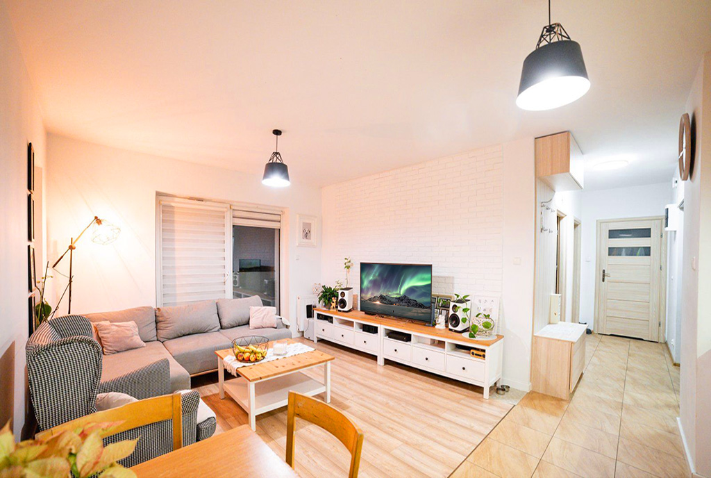 przestronny salon w ekskluzywnym apartamencie do sprzedaży Gdańsk