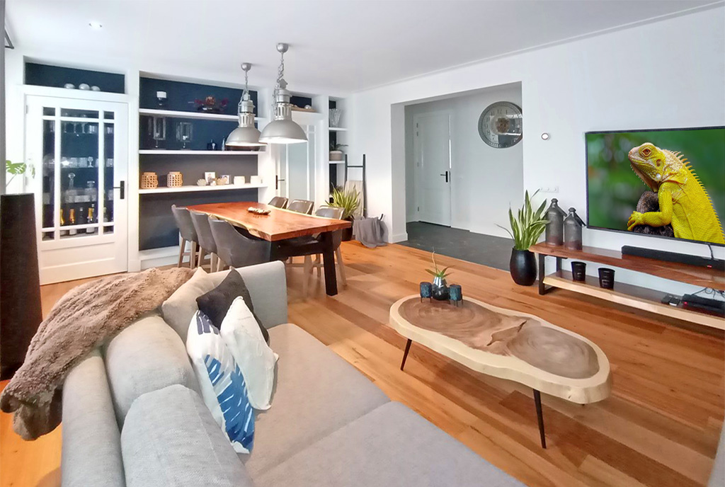zaprojektowany w nowoczesnym stylu pokój gościnny w luksusowym apartamencie do sprzedaży Mazury