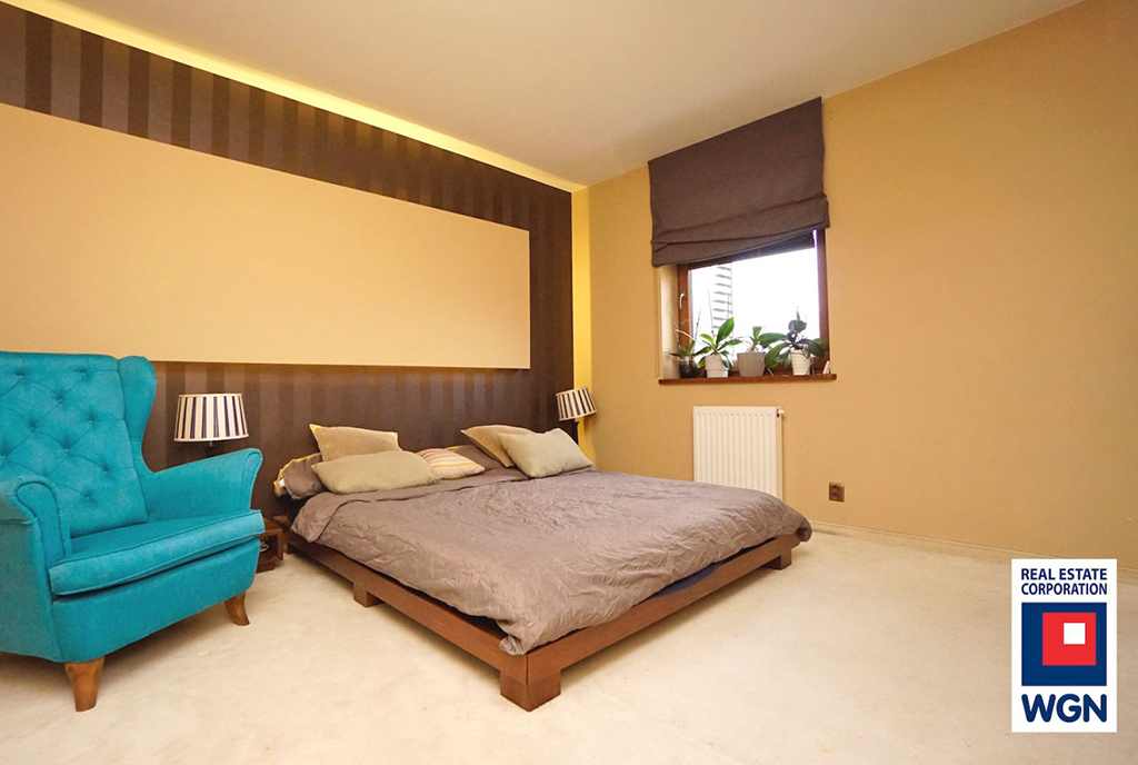 elegancka sypialnia w ekskluzywnym apartamencie na sprzedaż Poznań (okolice)