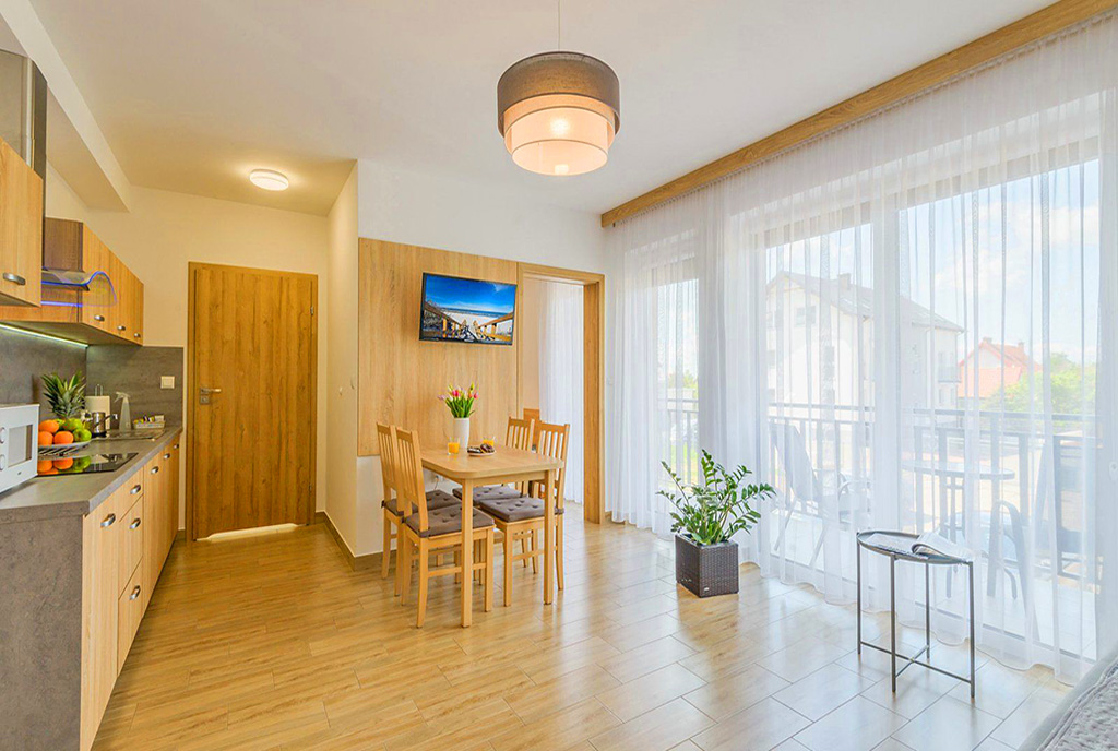 kameralne wnętrze salonu w ekskluzywnej willi do sprzedaży Gdańsk (okolice)