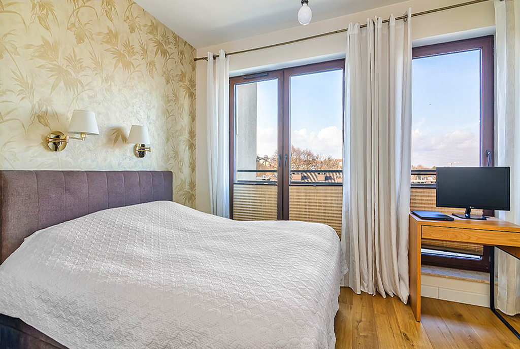 elegancka sypialnia w ekskluzywnym apartamencie na sprzedaż Gdynia