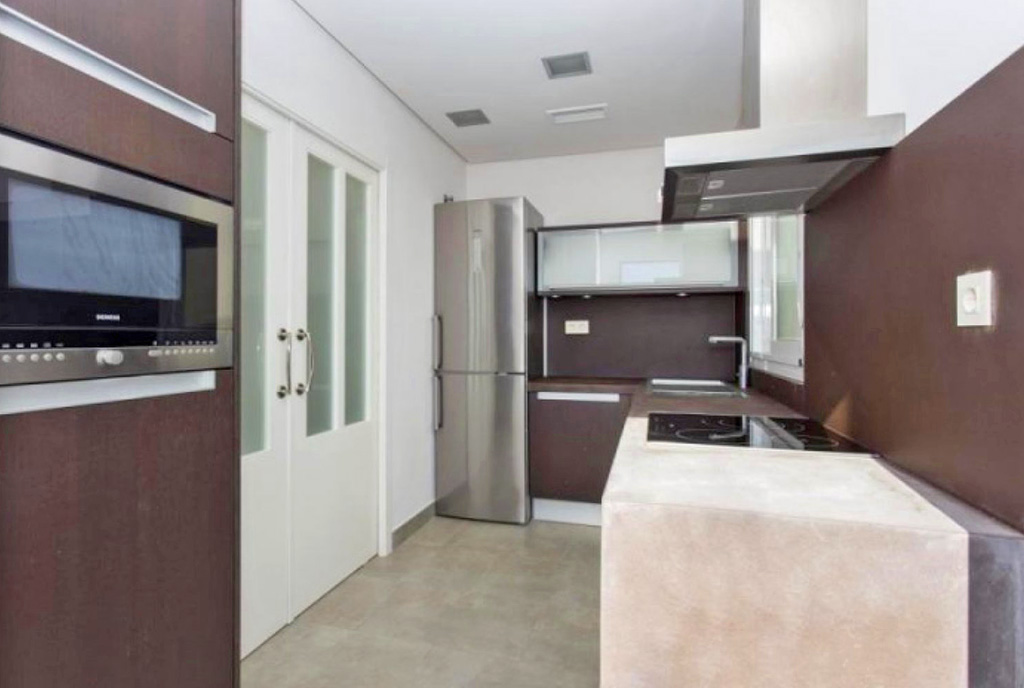 starannie zagospodarowana kuchnia w ekskluzywnym apartamencie do sprzedaży Hiszpania (Santa Pola)