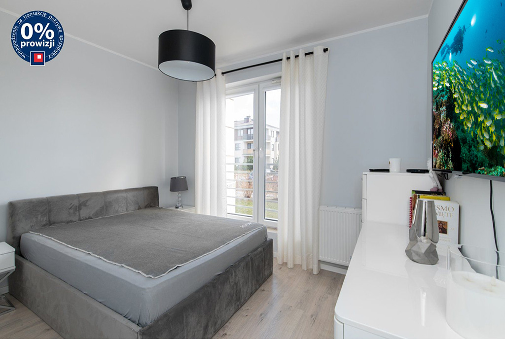 zbliżenie na sypialnię w ekskluzywnym apartamencie na sprzedaż Gdynia (okolice)