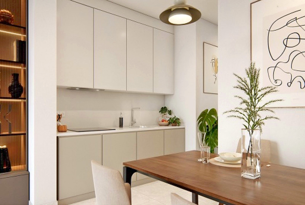 zaaranżowane we współczesnym designie wnętrze kuchni w ekskluzywnym apartamencie do sprzedaży Hiszpania (Torreblanca)
