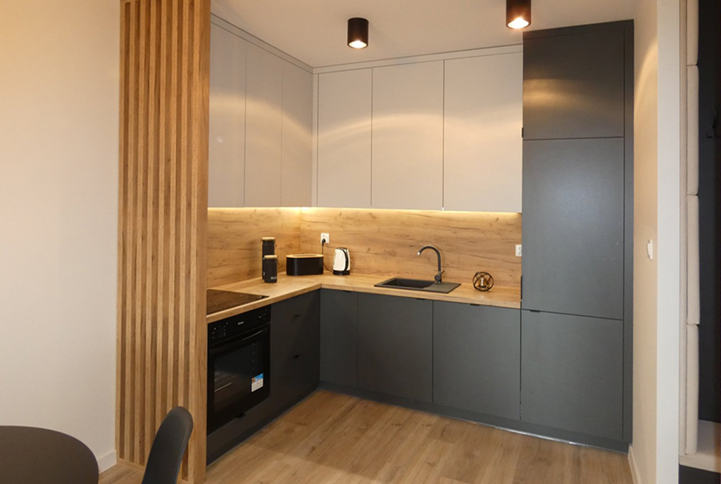 zbliżenie na kuchnię w luksusowym apartamencie na sprzedaż Ostrów Wielkopolski
