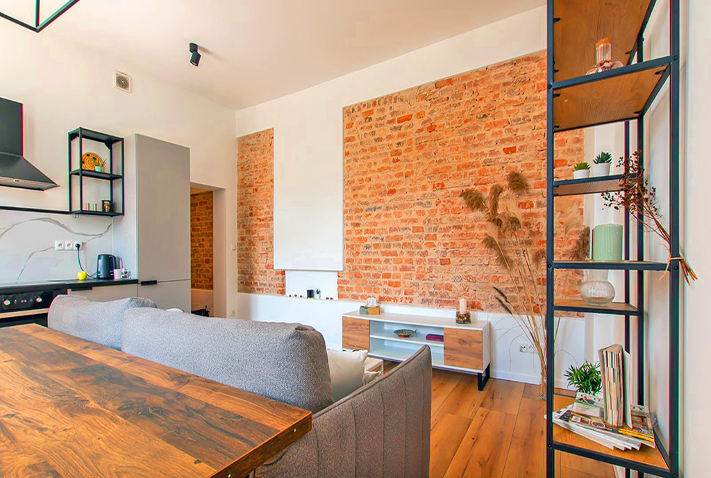 fragment salonu w luksusowym apartamencie na sprzedaż Poznań