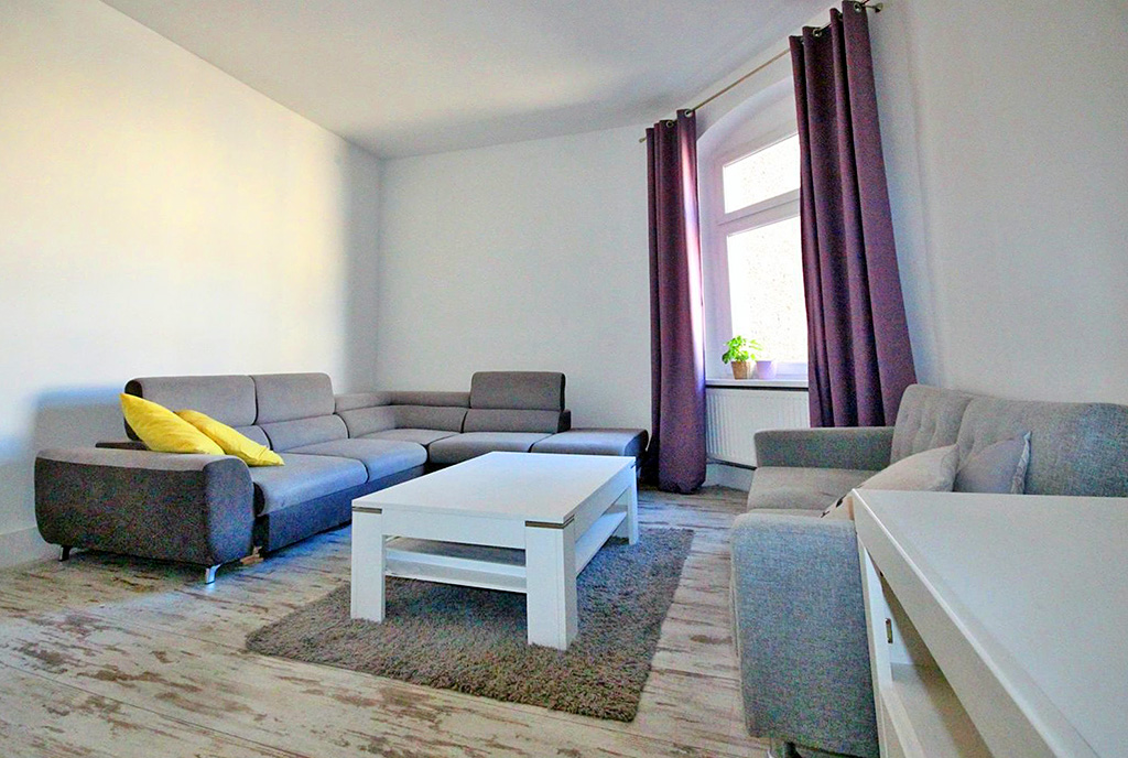 przeciwległa strona salonu w luksusowym apartamencie do sprzedaży Szczecin