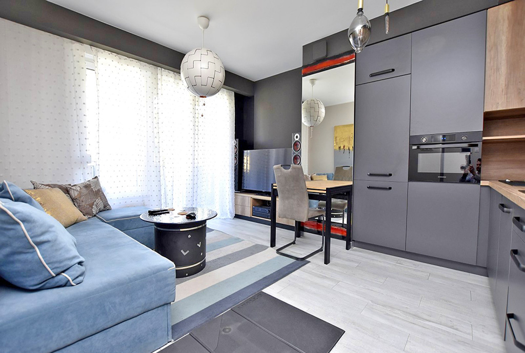 kameralny pokój dzienny w luksusowym apartamencie do wynajmu Inowrocław